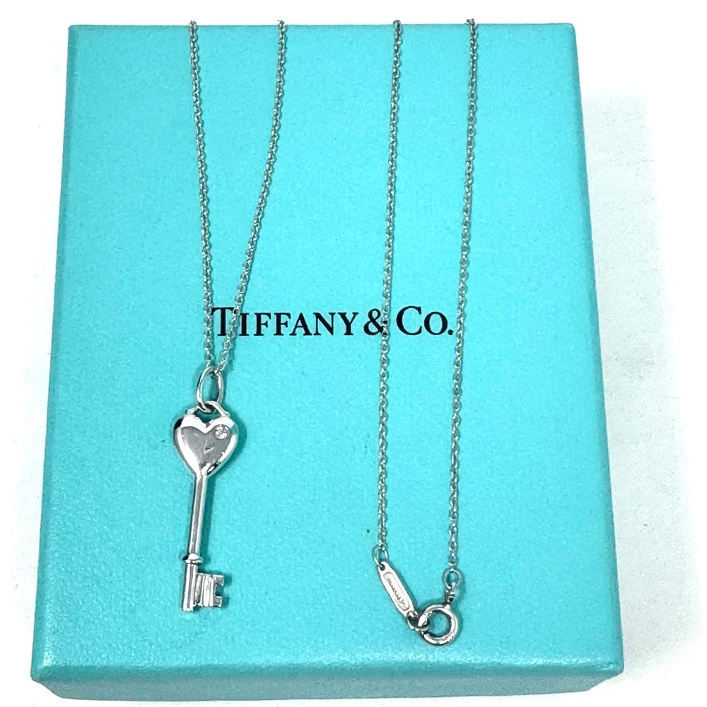 Authentic Tiffany & Co 1P Diamond Heart Key Pendant Necklace.